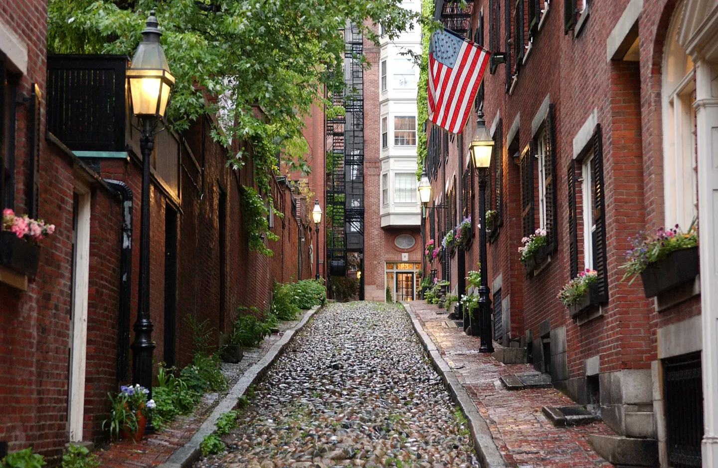 Acorn Street with brick homes and cobblestone paving in Boston