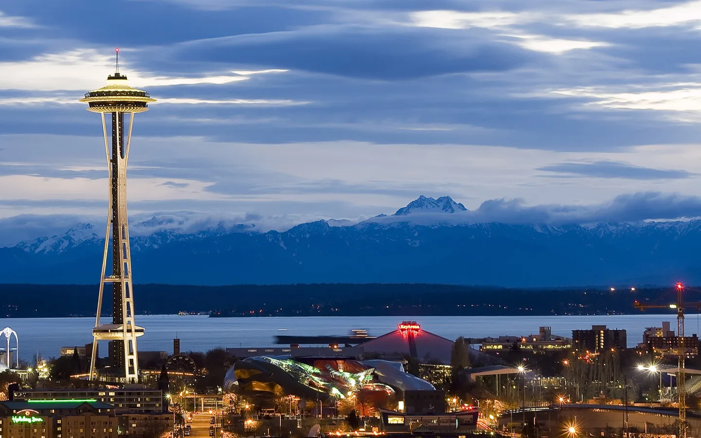 Seattle Space Needle and surrounding city at dusk